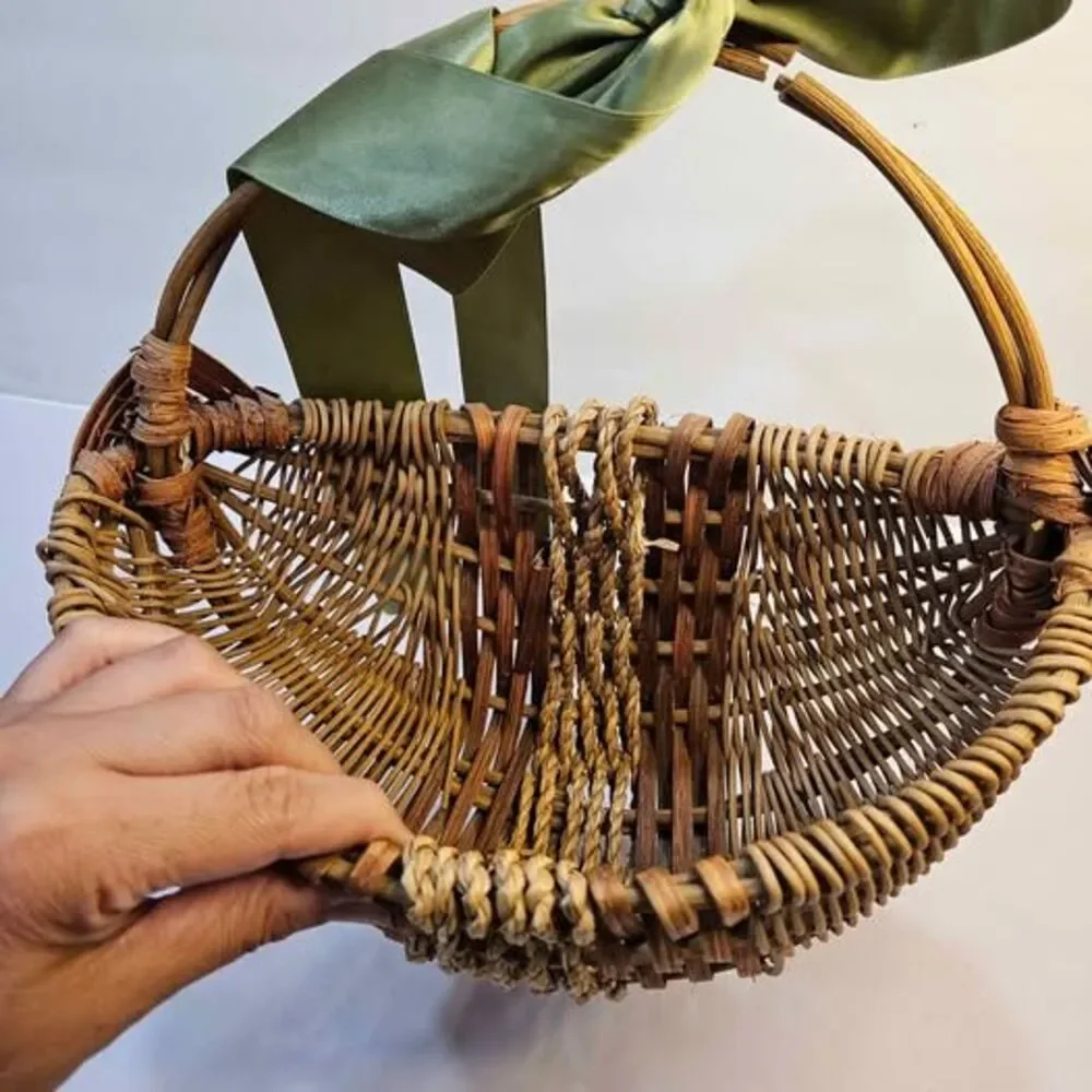 Wicker Basket with Green Ribbon, Broken Handle. Flat side. Wall decor